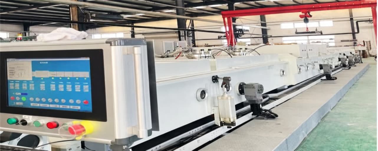 Continuous vacuum diffusion line with its control panel inside a magnet plant