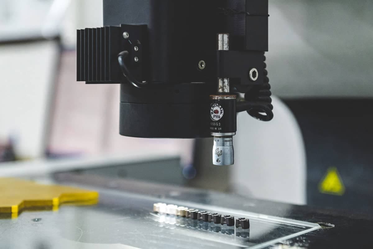 A CMM probe measuring finished sintered NdFeB magnets