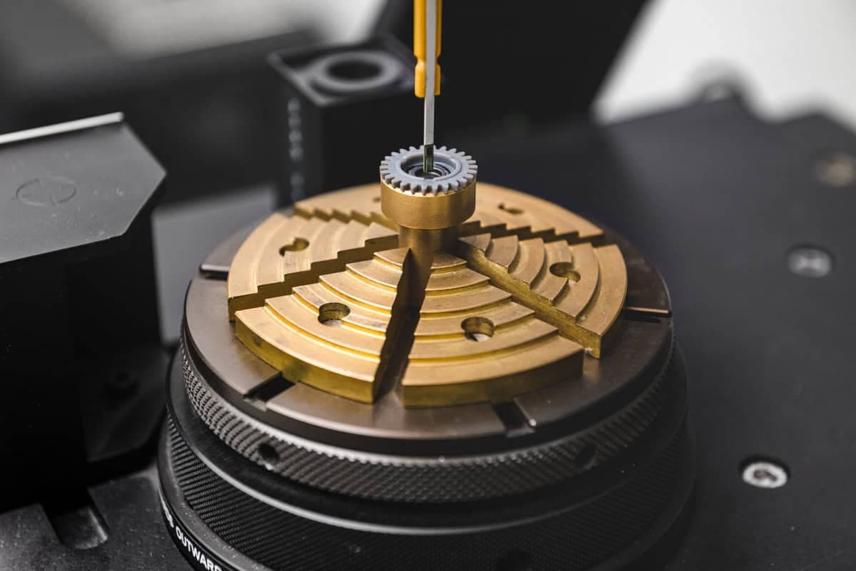 Multipole rotor seated in a segmented magnetizing fixture