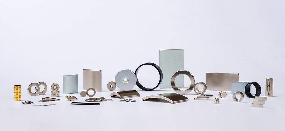 Mainrich sintered NdFeB product range including rings, arc segments, discs, blocks, rotors, and multiple coatings